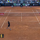 Zverev, in black, prepares for the drop shot